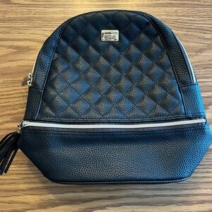 Black backpack purse.